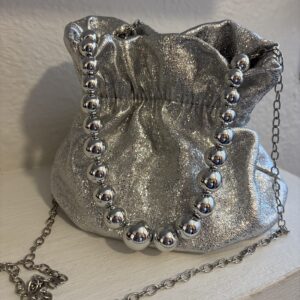 bolso saquito metálico