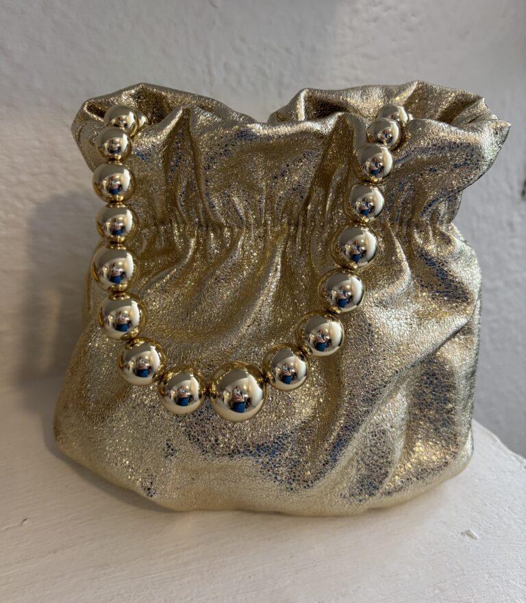 bolso saquito metálico